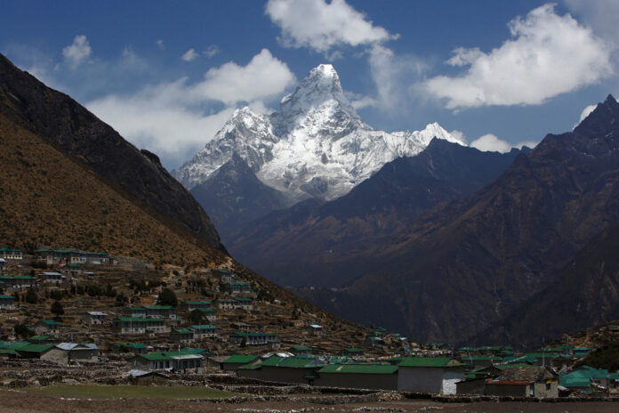 FILE PHOTO: Mount Ama Dablam, is seen in front of Khumjung Village in Solukhumbu District