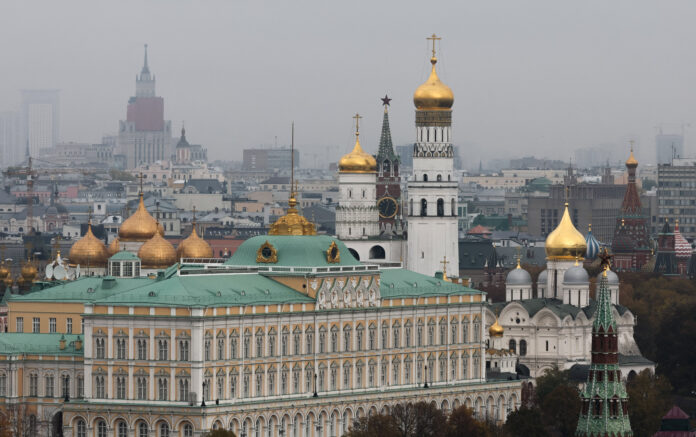 Kremlin's Spasskaya Tower, the Ivan the Great Bell tower and the Grand Kremlin Palace in Moscow