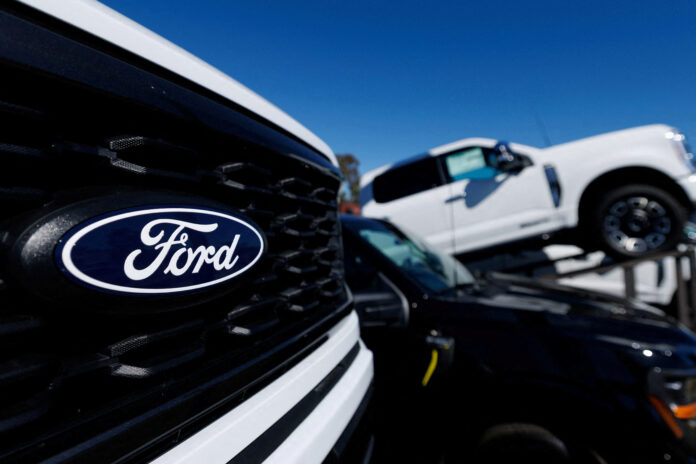 FILE PHOTO: A Ford logo on a Ford F-150 pickup truck for sale in Encinitas, California
