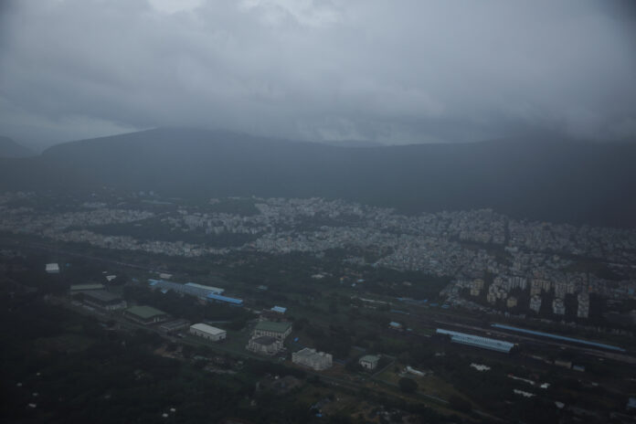 Clouds over the skyline of the city of Visakhapatnam before Cyclone Montha makes landfall near Kakinada district in the state of Andhra Pradesh