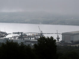 Un iranian și o româncă, acuzați că au încercat să pătrundă într-o bază de submarine din Marea Britanie