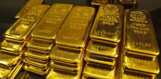 Aurul se prăbușește în martie: oportunitate rară de cumpărare sau începutul unei corecții mai dure?